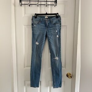 Distressed Blue Jeans